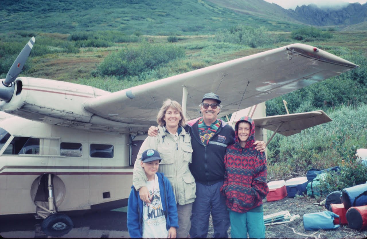 Author Doug Pope with his family  in front of a Widgeon amphibious aircraft on Goodnews Lake in southwest Alaska at the beginning of a river trip on the Goodnews River, a nationally designated Wild and Scenic River.